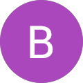Purple circle with white letter B in the center.